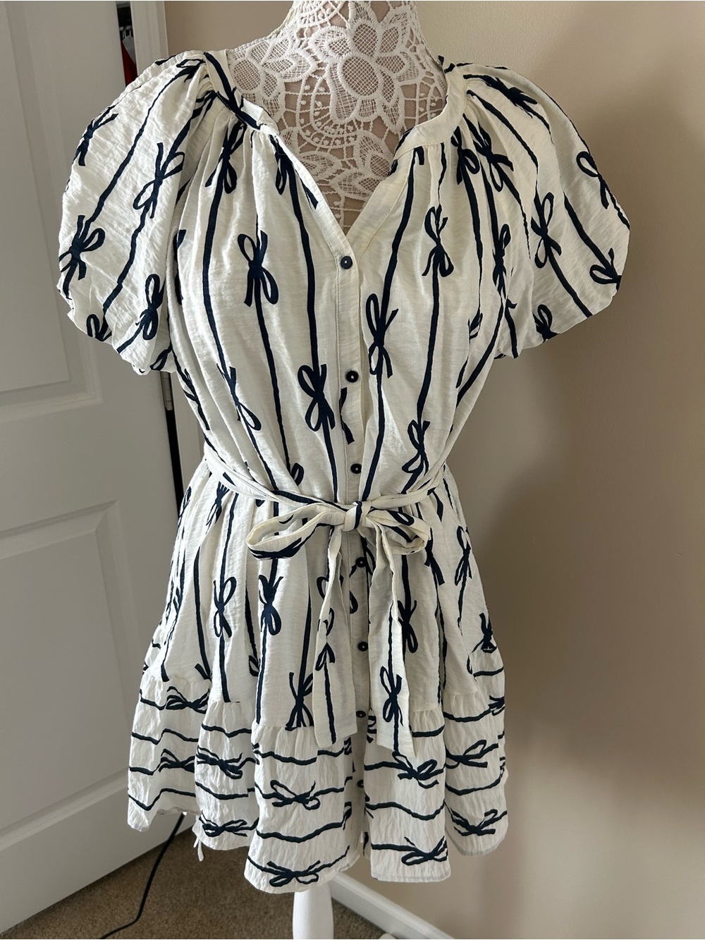 Umgee White Mini Dress with Navy Bow Pattern